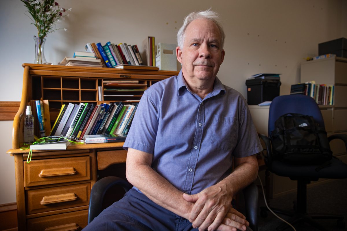 Colin Gordon poses for a portrait in his office in Schaeffer Hall on Thursday, March 12, 2026. Gordon is a history professor who was recognized as the UI Distinguished Chair. The ceremony will be held in May. (Ava Neumaier / The Daily Iowan).