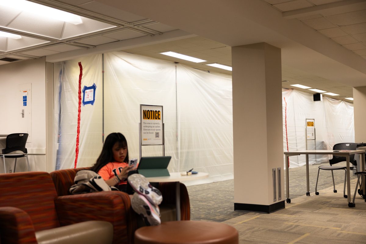 Students study near ongoing renovations in the Main Library in Iowa City on Tuesday, March 31, 2026. (Liz Sleper / The Daily Iowan)