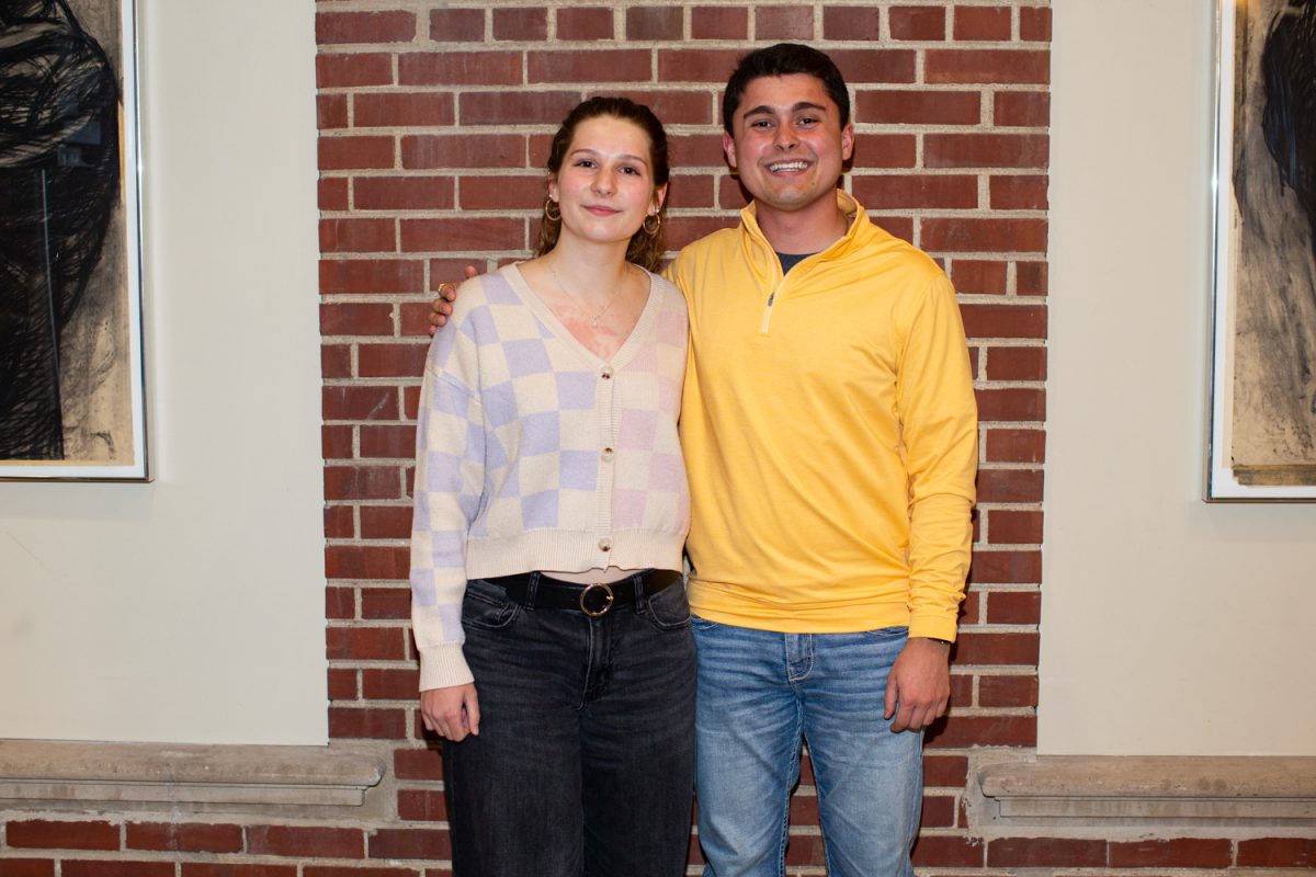 Victoria Johnson and Nathan Sharar pose for a portrait after announcing the Undergraduate Student Government results in the Hubbard Commons on Friday, April 3, 3036. (Ava Neumaier / The Daily Iowan)