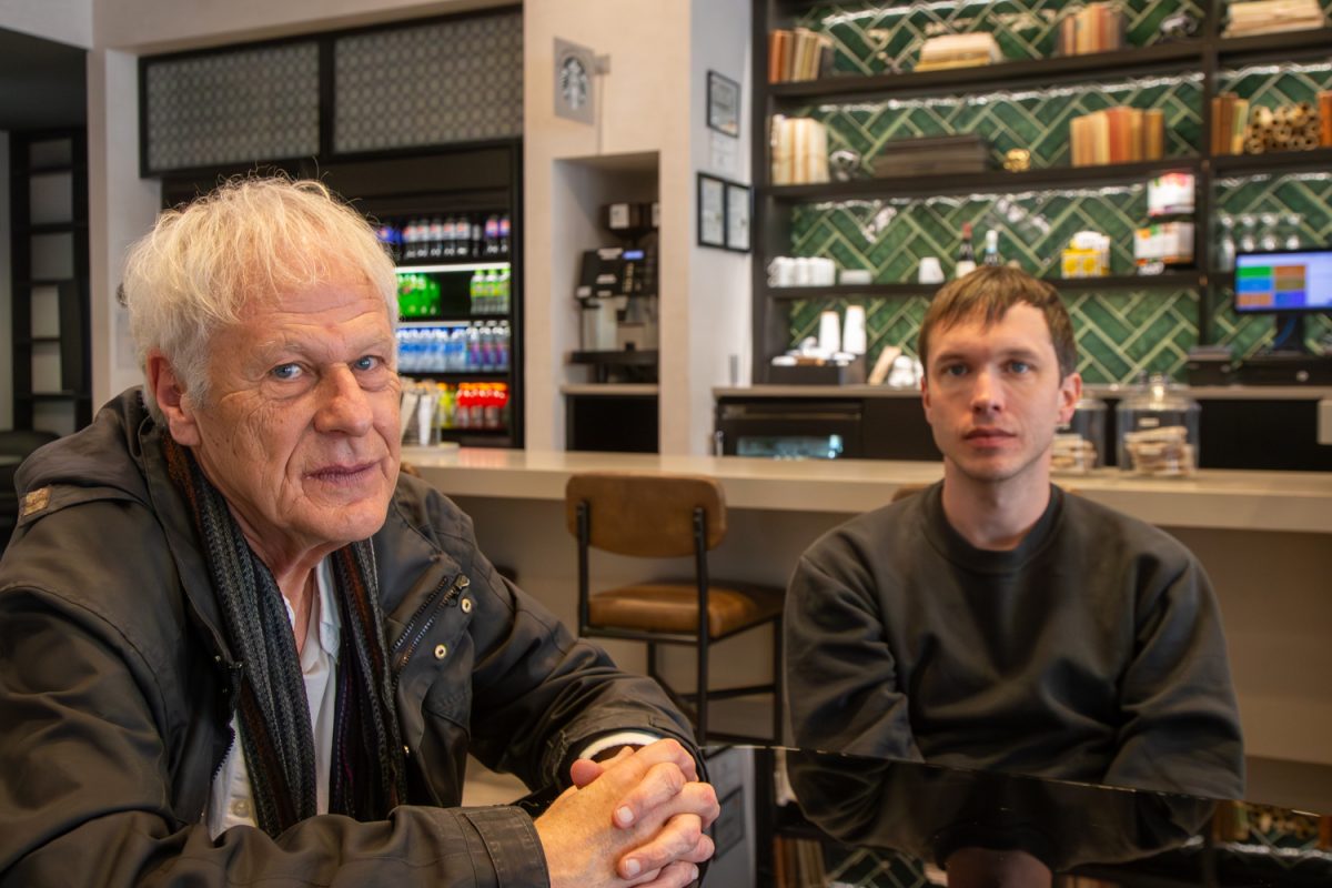 Dennis Cooper and Zac Farley, directors of Room Temperature, pose for a portrait at Hyatt Place in Downtown Iowa City, Iowa, on Monday, April 6, 2026. Room Temperature screens at 7pm on April 7. (Sal Yang/The Daily Iowan)
