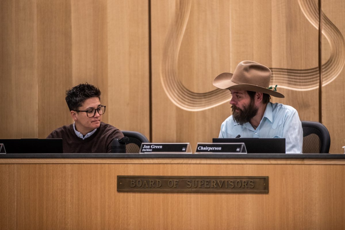 Chairperson Jon Green and V Fixmer-Oraiz share glances in-between presentations at the Board of Supervisors meeting. The Johnson County Board of Supervisors met on Wednesday, April 8th, 2026 in Iowa City. (Danny Enright/The Daily Iowan)