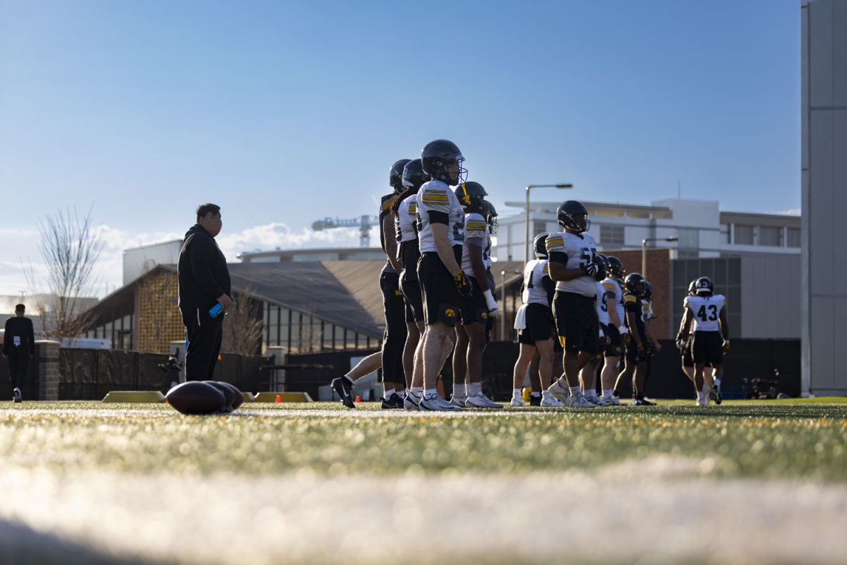 Players wait to begin a drill during an open practice for the media at the Ronald D. and Margaret L. Kenyon Football Practice Facility on Thursday, April 9, 2026. Open practice for fans is set for April 25 in Kinnick Stadium, gates open at 9:45am CST. (Samantha DeFily/The Daily Iowan)