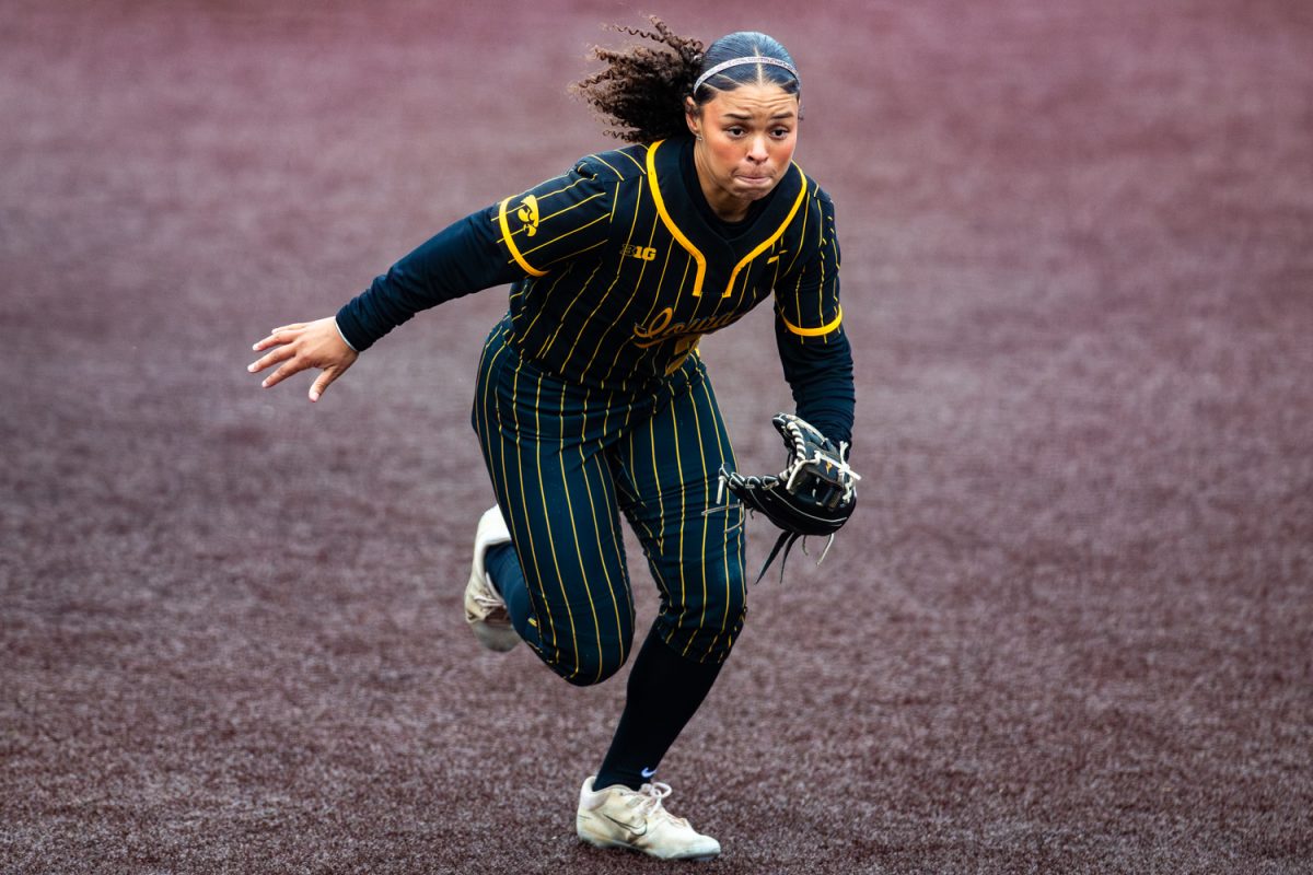 Iowa’s Avery Jackson sprints to retrieve ball during a softball game between the Iowa Hawkeyes and the Georgia Tech Jackets at Bob Pearl Stadium in Iowa City, IA on Saturday, April 11th, 2026. The Jackets defeated the Hawkeyes 8-0 after an opening 2-1 loss on Friday, April 10th, 2026. (Reece Schrader/Daily Iowan)