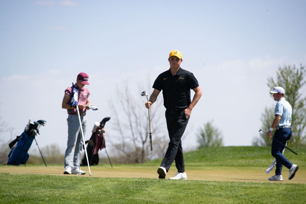 University of Iowa sophomore Chance Rinkol finishes a putt at the 32nd Hawkeye Invitational at Blue Top Ridge Golf Course in Riverside, Iowa on Tuesday, April 21, 2026. Rinkol tied for 28th place, but the Hawkeyes came in first place overall. (Liz Sleper / The Daily Iowan)