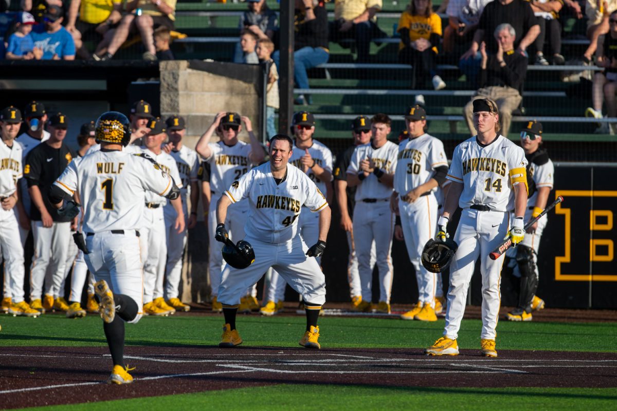 Iowa utility player Caleb Wulf runs to home after hitting a homer in the baseball game between Iowa and Western Illinois at Duane Banks Field on Tuesday, April 21, 2026. The Hawkeyes won in the seventh-inning with a score of 22-3 over the Leathernecks. (Travis Crabb / The Daily Iowan)