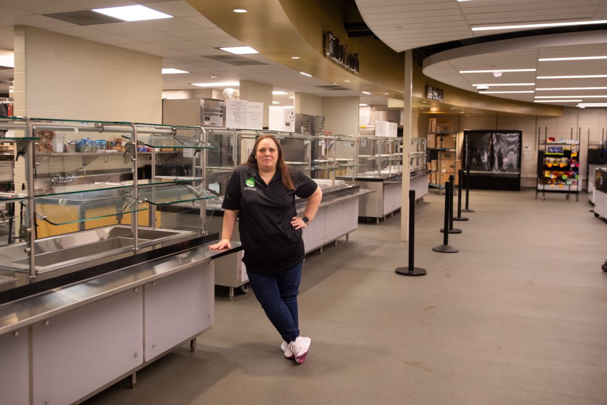 Melissa Ellett poses for a photo in the West High kitchen in Iowa City, Iowa on Wednesday April 23, 2026. Ellett says she has been working in food service since she graduated high school and her role at West High combines the two things she loves, food and helping kids.(Annika Nelson / The Daily Iowan)