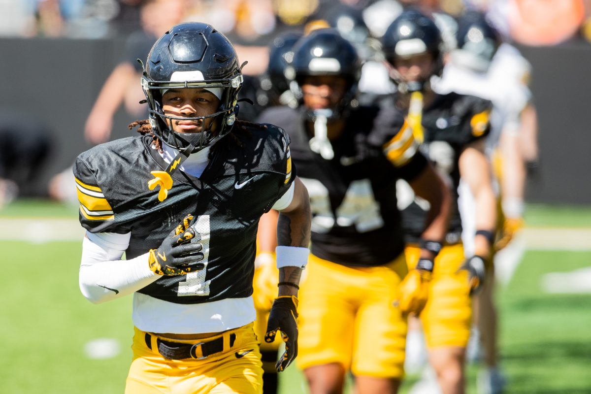 Iowa wide receiver KJ Parker leads warm ups during a spring football practice on Saturday, April 25, 2026 at Kinnick Stadium in Iowa City, Iowa.