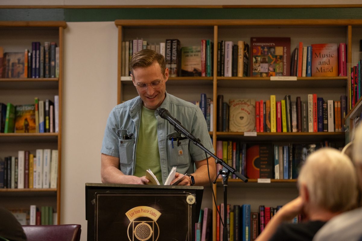 Author Kevin Mason reads excerpts from his book Retracing the Dragon Trail in Iowa at Prairie Lights Book Store in Iowa City, Iowa on Monday May 4, 2026. (Annika Nelson / The Daily Iowan).