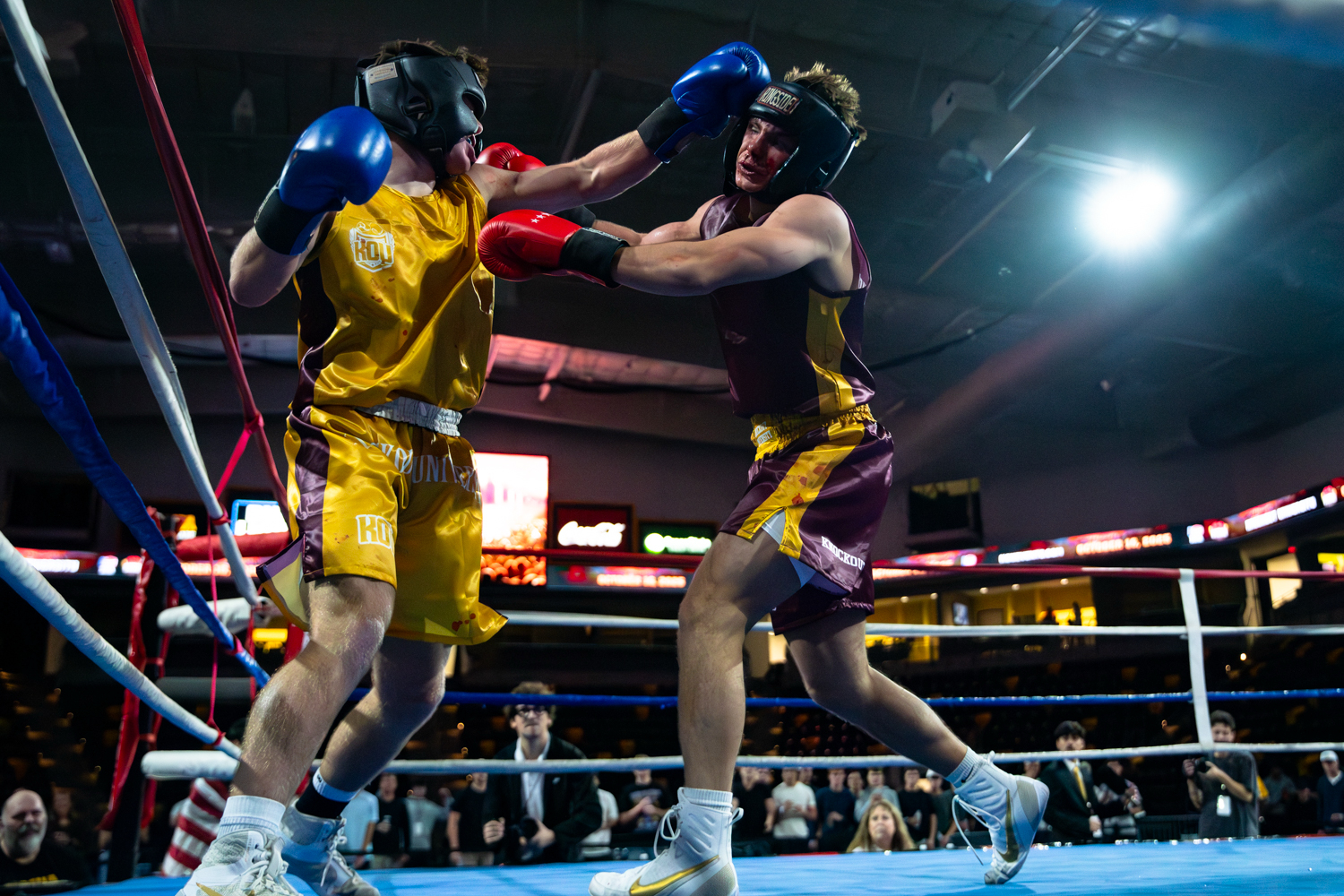 Samson Diener punches Connor Doyle during a Knockout University fight at Xtream Arena in Coralville, Iowa on Thursday, October. 16, 2025. This was the first time Knockout University has come to Iowa.