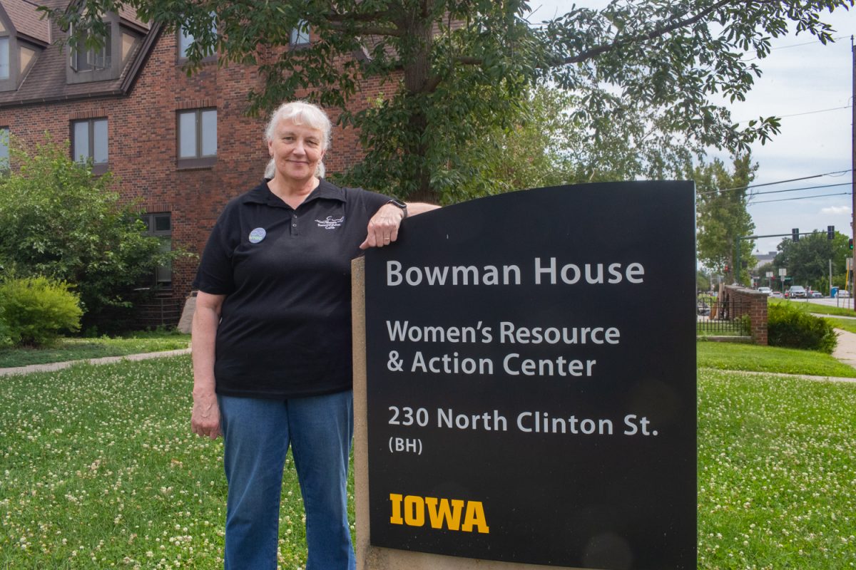 Linda Kroon the Director of the Women’s Resource and Action Center in front of the Bowman House in Iowa City on Thursday, July 9, 2026. The WRAC program is being redistributed into other entities of student life. (Travis Crabb / The Daily Iowan)