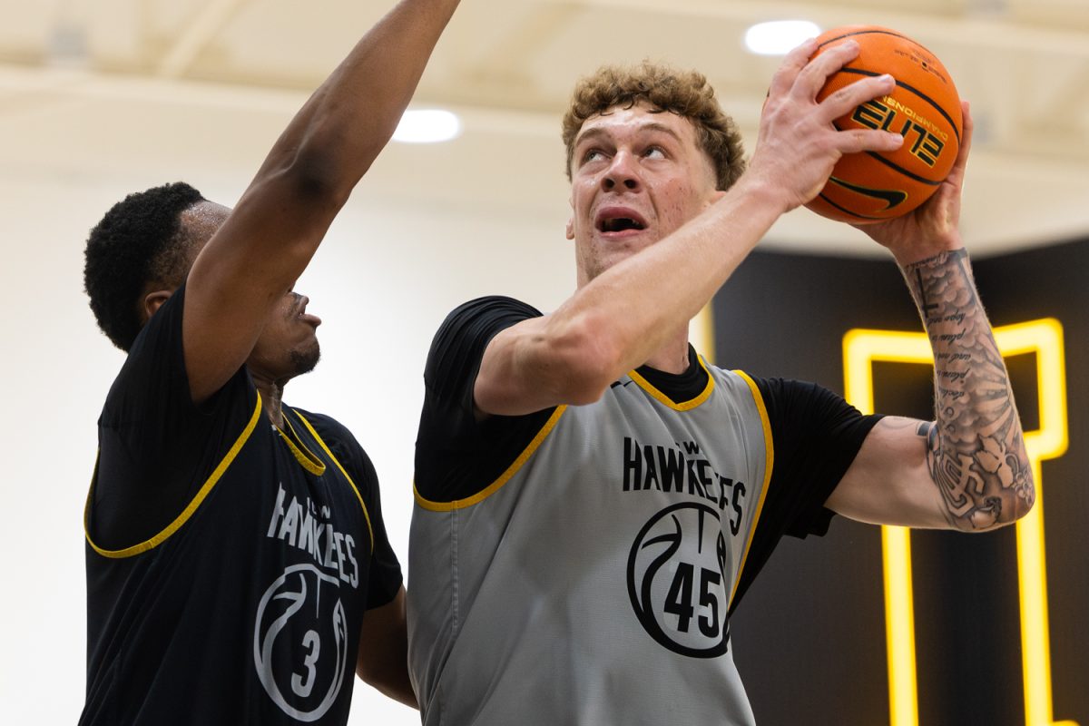 Center Andrew McKeever attempts to score during an open media session hosted by the Iowa Men’s Basketball team at Carver Hawkeye Arena in Iowa City, IA on Wednesday, July 15, 2026.